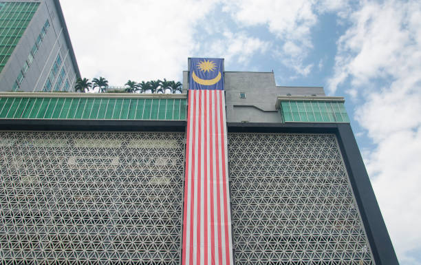 istock malaysian flag on a building exterior 1317477668