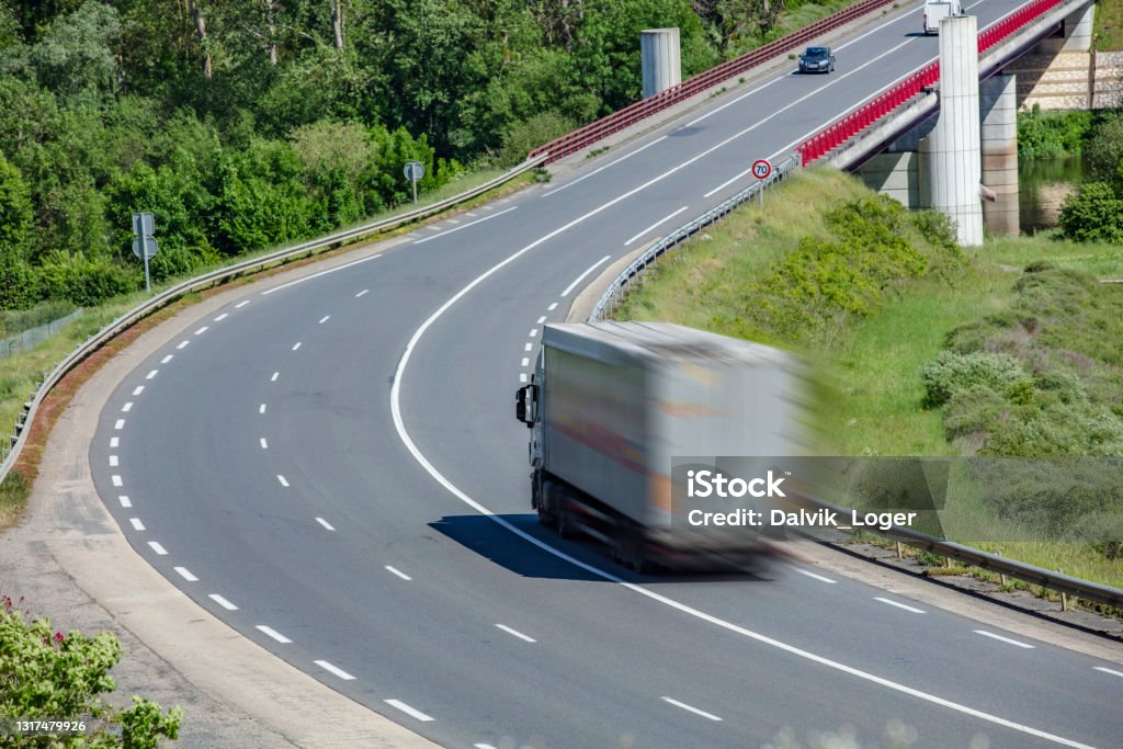 road transport Long exposure with a truck on highway France Stock Photo