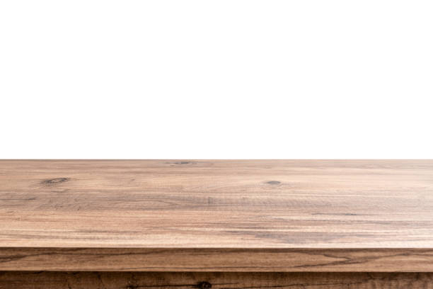 白い背景に分離された空の茶色の木製のテーブルトップ - テーブル ストックフォトと画像