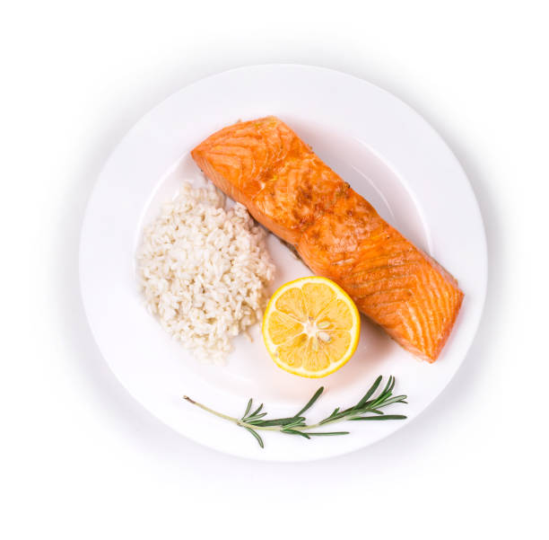 istock Fried salmon fillet with rice. 1317485604