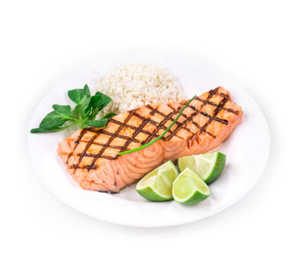 istock Roasted salmon fillets with rice. 1317485717