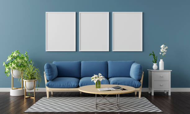 istock Blue sofa in living room with Three frame mockup, 3D rendering 1317488739