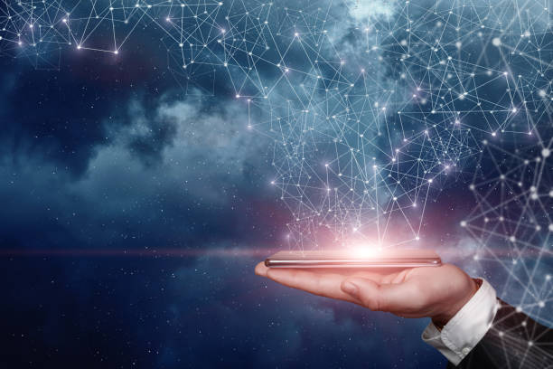 istock Hand shows a telephone that is connected to space by a network of connections. 1317489429
