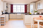 Painted wood kitchen furniture, UK luxury kitchen interior
