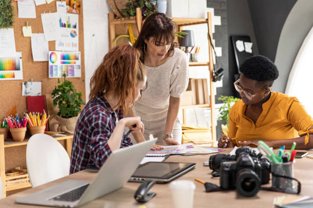 istock Three creative businesswomen having a meeting together 1317492881