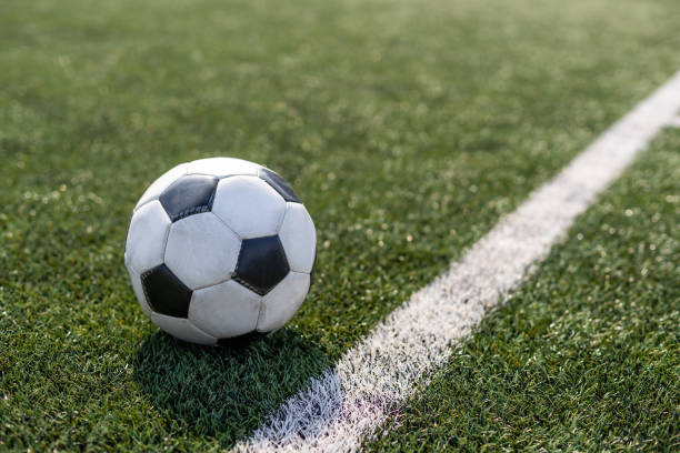 istock soccer on grass and stadium. ball in the stadium. 1317492996
