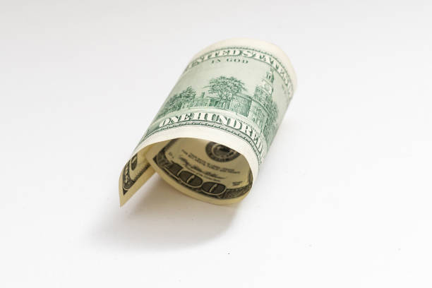 istock American bank notes isolated on the white background 1317494015