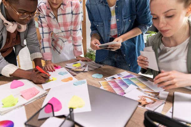 istock Female photographers working on a creative project together 1317494034