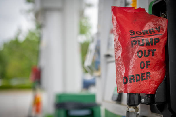 Fuel Pump Out of Order A fuel pump is bagged and labeled as "Out of Order." energy crisis photos stock pictures, royalty-free photos & images