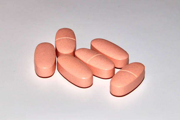 istock nutrition pills. multivitamin tablets on a gray background 1317495416