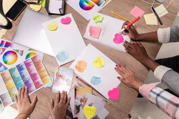 istock Female photographers planning future photoshoots 1317497775