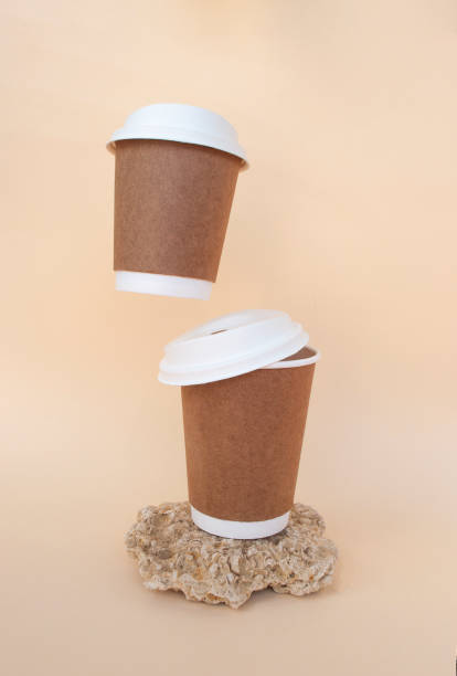 istock Bidegradable paper brown coffee cups with biodegradable white lids. 1317498028