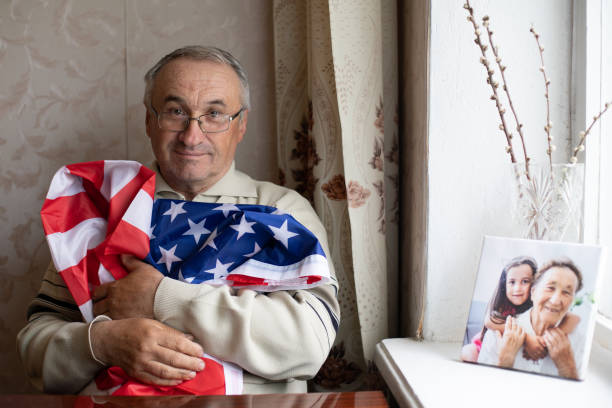 istock Senior man with american flag 1317498546