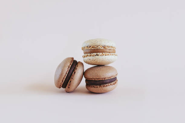 istock Tasty French macarons on a pastel background. 1317500301