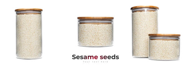 istock Sesame seeds in glass jar isolated on a white background 1317501440