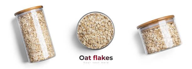 istock Oat flakes in a glass jar isolated on a white background 1317501555