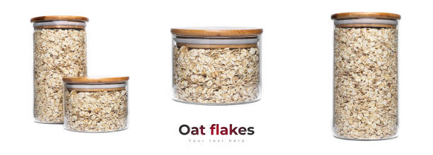 istock Oat flakes in a glass jar isolated on a white background 1317502843
