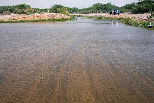Jeddah, Saudi Arabia, March 08, 2021: The river is located in Al-Khurma Valley (Sanabil district)  40 km South of Jeddah. This beautiful river in Jeddah is actually a torrent stream nevertheless locals called it \