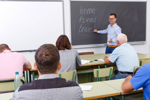 istock Young lecturer talking to mixed age  students 1317505004