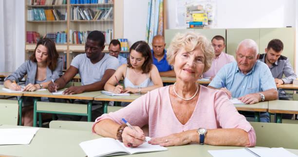 istock Mature woman take a written exam 1317505469