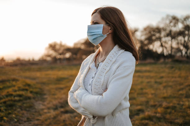istock Young woman with protective face mask 1317509934