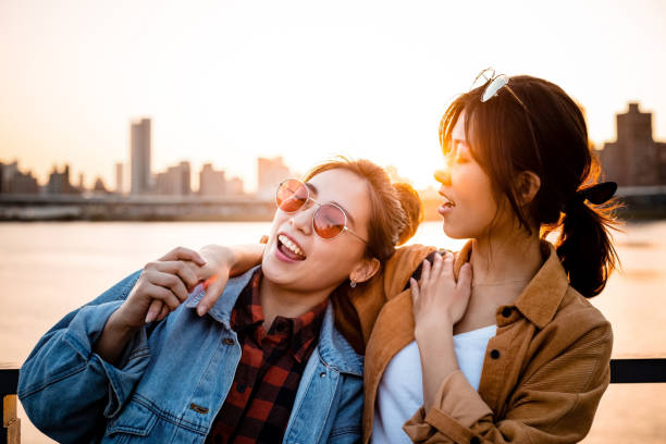 istock Friends enjoying weekend in city during sunset 1317518545