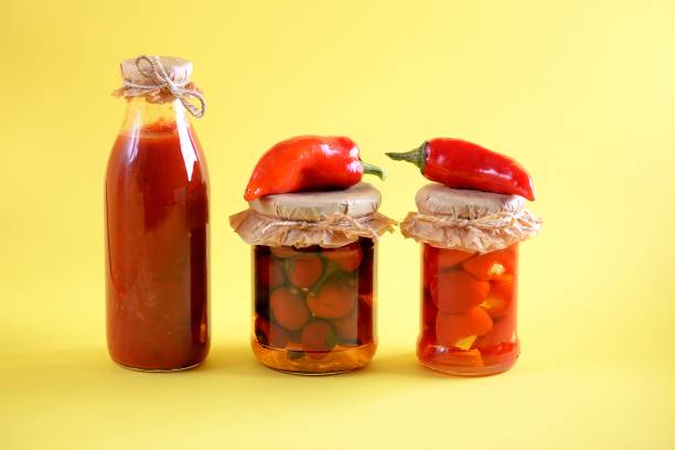 istock Pickled red pepper snacks - pizza sauce, cherry pepper with soft cheese and hot cherry pepper. 1317524975