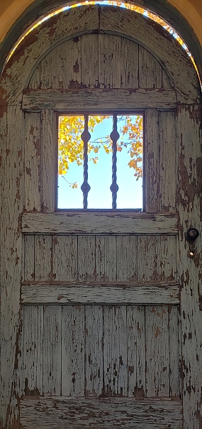 Photograph: Rustic door at the La Posada Hotel in Winslow, Arizona.