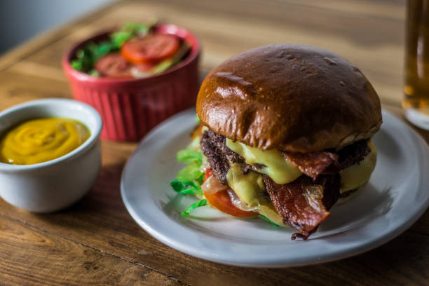 Classic cheese Burger grilled angus beef tomato, lettuce & toasted bun