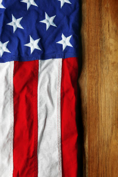 istock USA flag on wooden background 1317532843