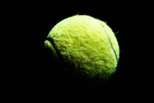 istock High Contrast Isolated Tennis Ball in Shadow 1317536788