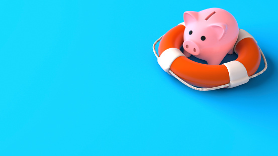 Savings insurance. Piggy bank in lifebuoy on a blue background. Copy space for text. Help in saving money. 3d render.