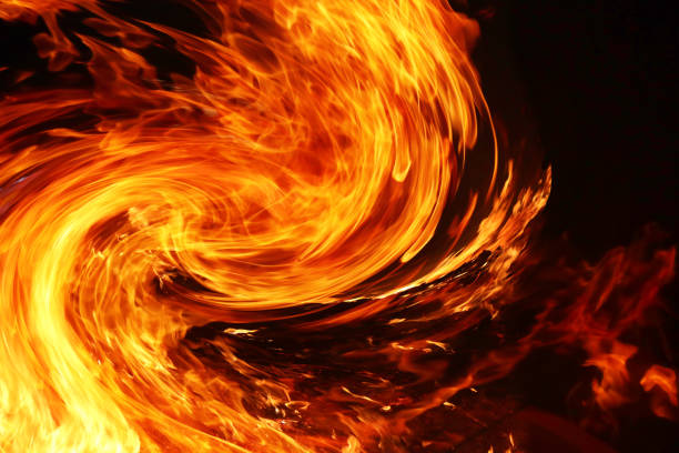 istock Background image of swirling flames approaching 1317543476