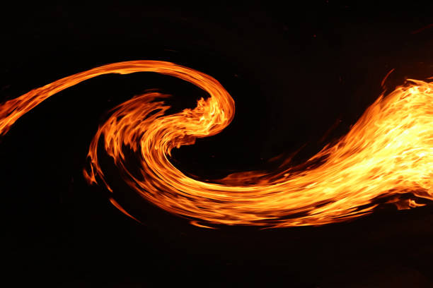 istock Background image of swirling flames approaching 1317543483