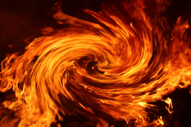 istock Background image of swirling flames approaching 1317543514