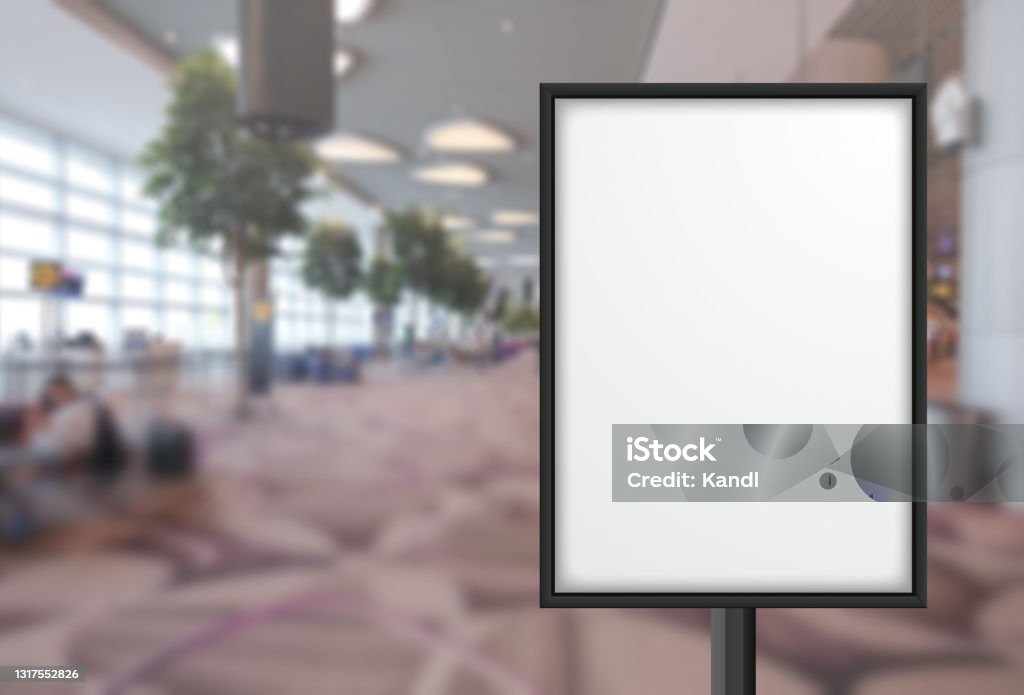 Blank advertising poster banner mockup in modern airport retail environment; large digital lightbox display screen. Billboard, poster, out-of-home OOH media display space.. Blank advertising poster banner mockup in modern airport retail environment; large digital lightbox display screen. Billboard, poster, out-of-home OOH media display space Airport Stock Photo