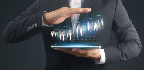 istock Businessman plan graph growth increase of chart positive indicators in his business,tablet in hand 1317553076