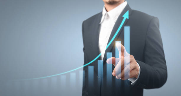 istock Businessman plan graph growth and increase of chart positive indicators 1317553382