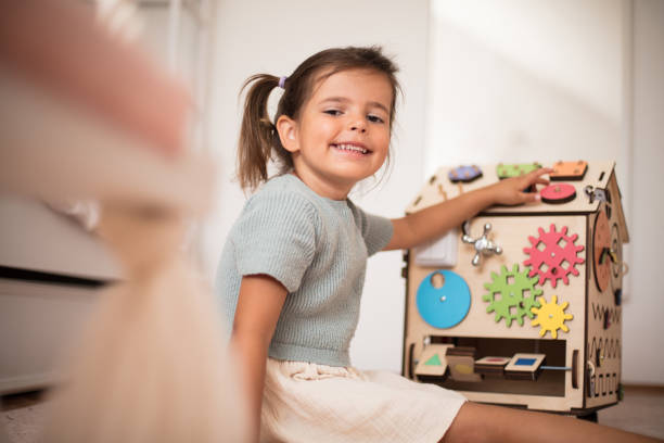 istock Toddler playing interactive games for good development at home. 1317554365
