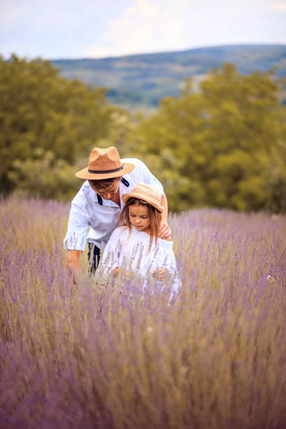 istock Father and daughter in lavender field. 1317557156