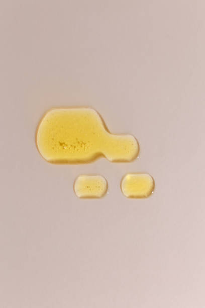 istock Cosmetic cream liquid texture on neutral background 1317558946