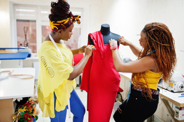 istock Black seamstress women 1317560255