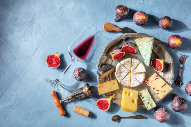 istock Wine and cheese. Red wine and various cheeses 1317563130
