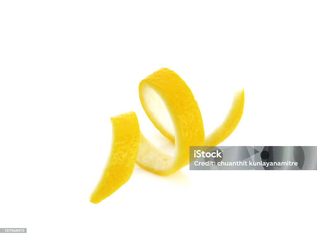 Lemon peel twist isolated on a white Citrus lemon peel twist isolated on a white background Lemon - Fruit Stock Photo