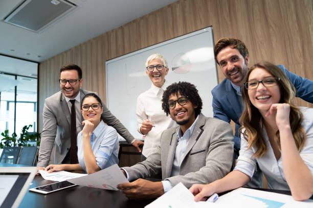 istock Happy diverse business colleagues meeting, working in modern office 1317570185