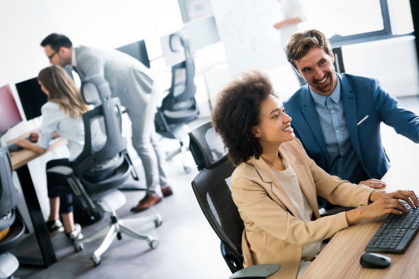 istock Startup business people group of programmer working as team to find solution to problem 1317570253