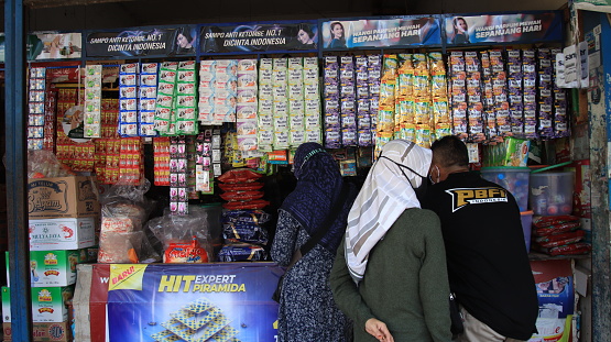 People going about their business at Bazaar Market in Medina District of Marrakesh, Morocco