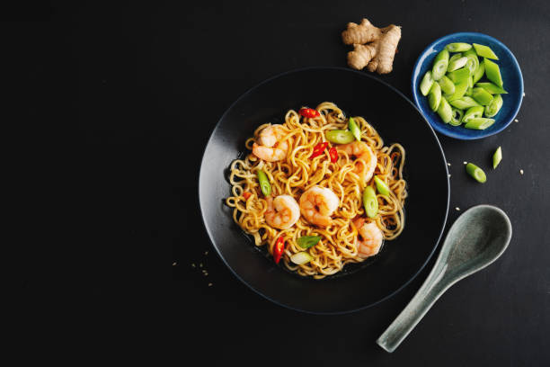 istock Asian noodles on plate on dark background 1317580311