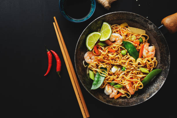 istock Asian noodles on plate on dark background 1317580715