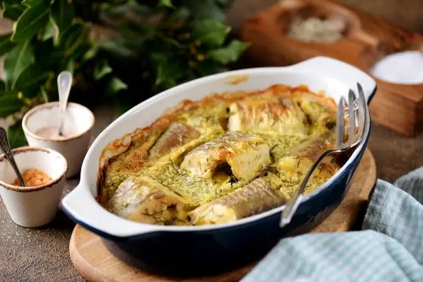 White fish hake baked in egg, milk and flour.